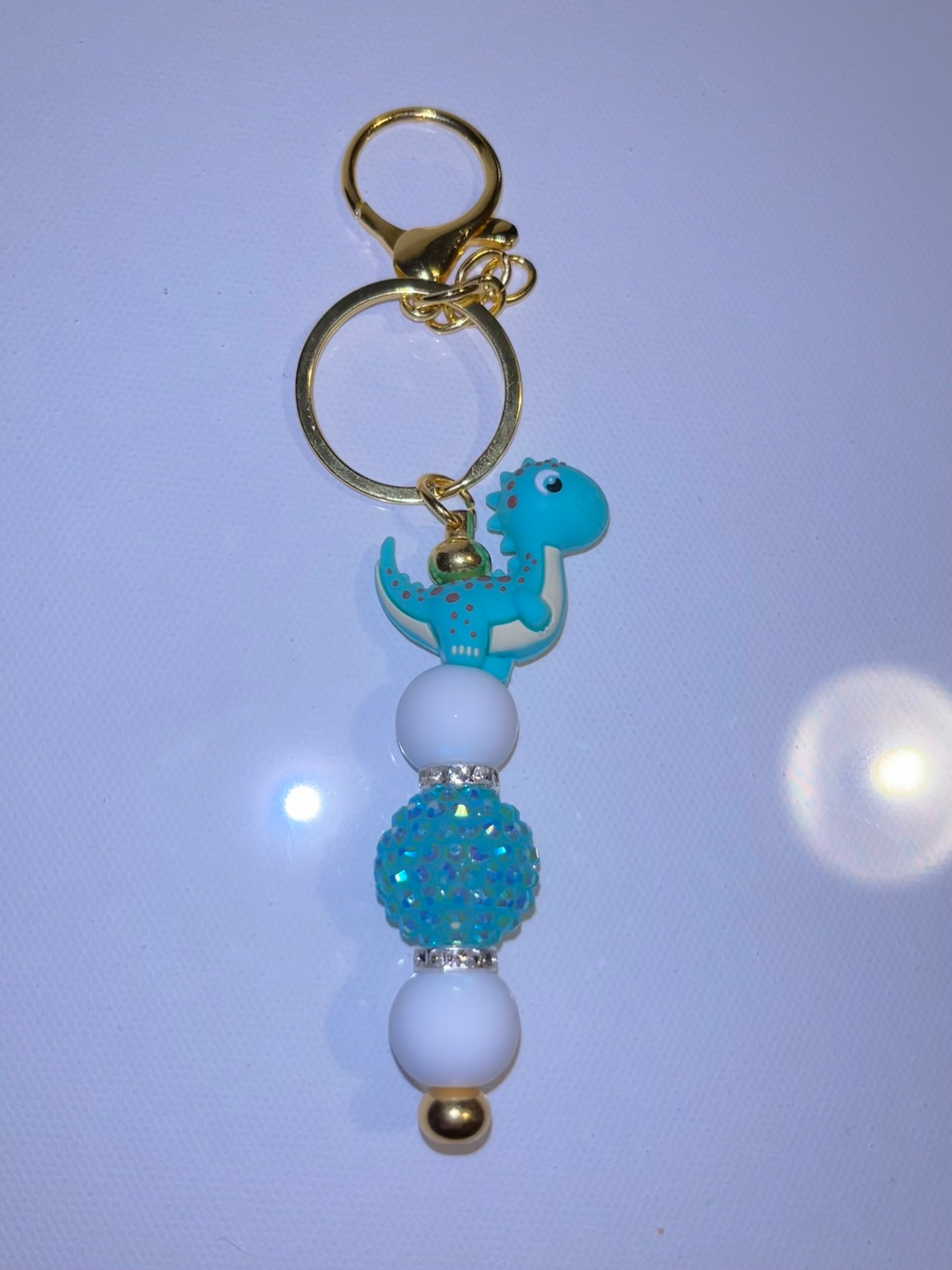 Cute Teal Dinosaur Beaded Keychain with Gold Hardware