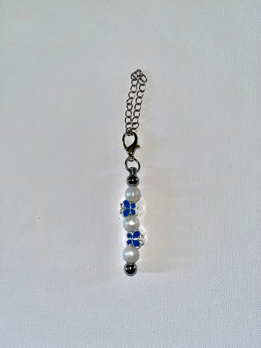 Cup Charm with Blue & Silver Butterflies & Pearlescent White Beads