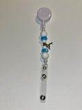 Beaded Badge Reel w/White Silicone & Blue Glass Beads and Silver Dolphin Charm