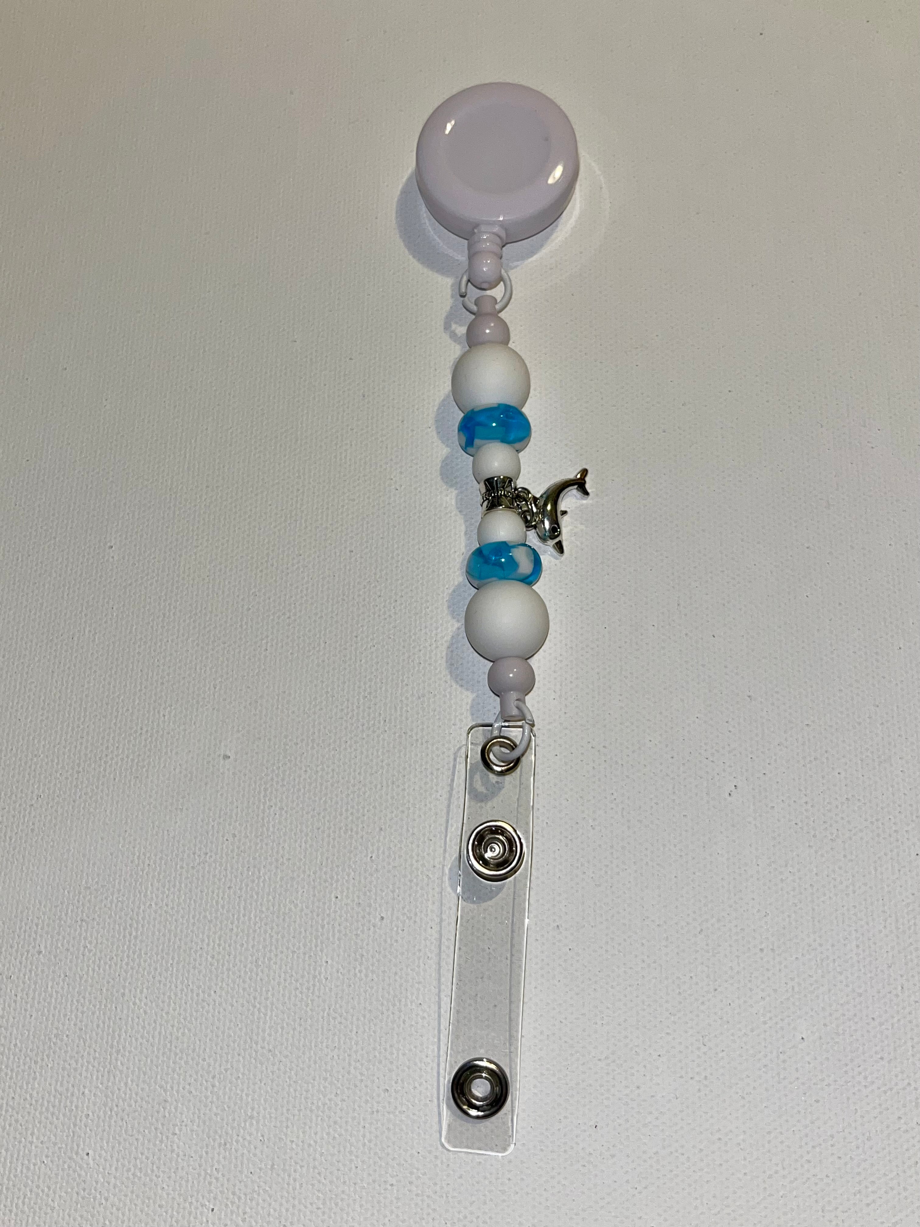 Beaded Badge Reel w/White Silicone & Blue Glass Beads and Silver Dolphin Charm