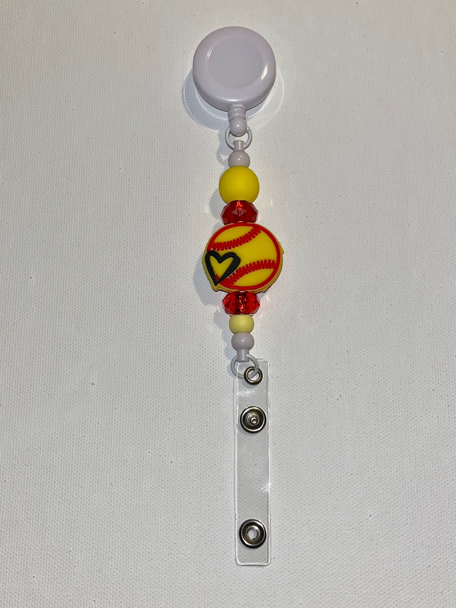 Yellow Softball w/Black Heart Badge Reel w/Yellow Beads & Red Crystal Accents