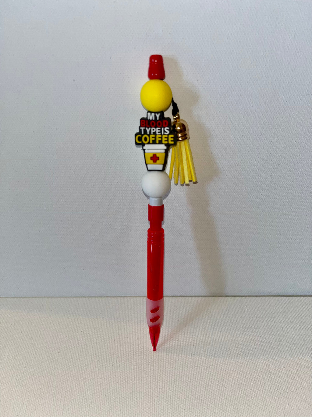 Novelty Red, White & Yellow ‘My Blood Type Is Coffee’ Mechanical Pencil w/Tassel