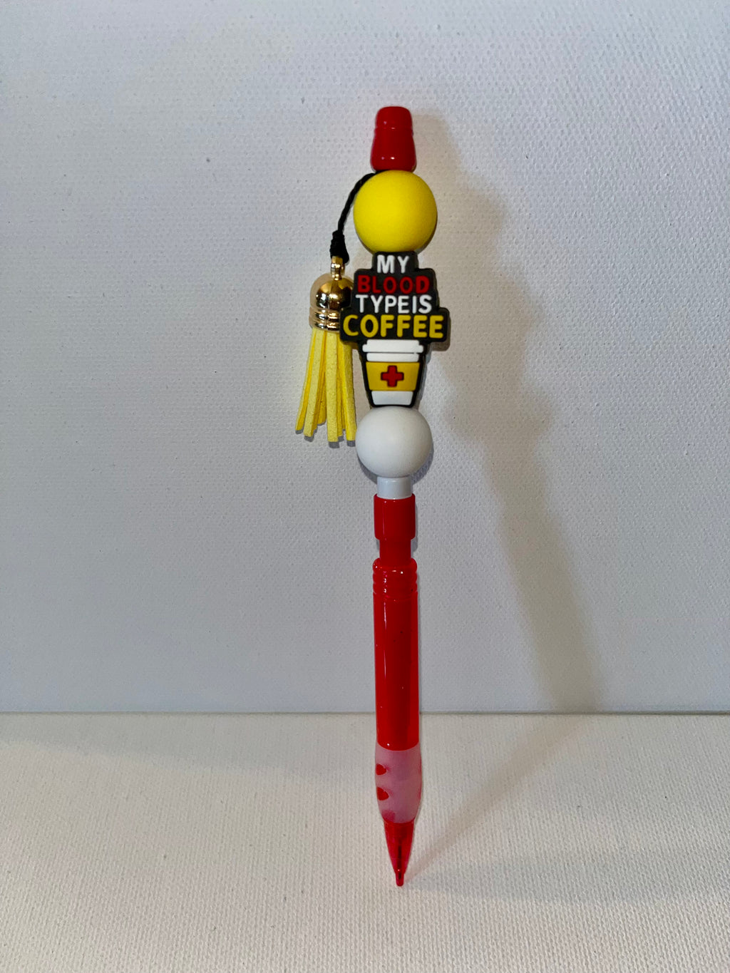 Novelty Red, White & Yellow ‘My Blood Type Is Coffee’ Mechanical Pencil w/Tassel