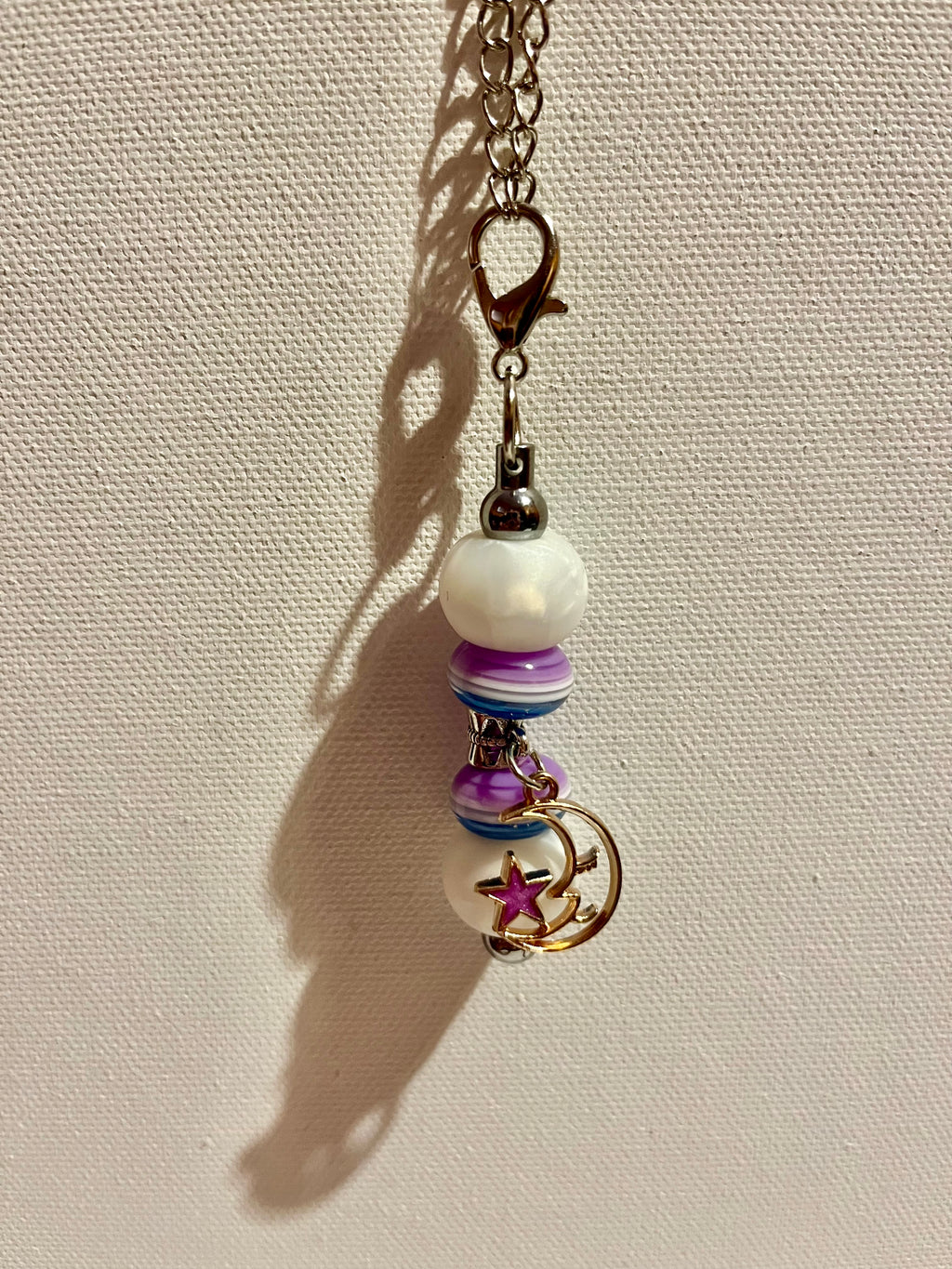 Striped Pearly White/Blue/Purple Beaded Cup Charm w/a Moon & Star Charm Accent