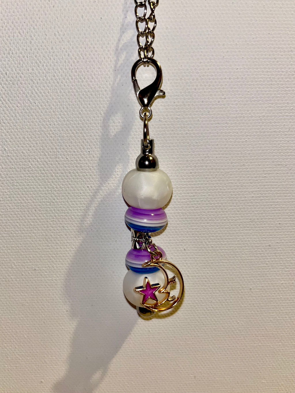 Striped Pearly White/Blue/Purple Beaded Cup Charm w/a Moon & Star Charm Accent