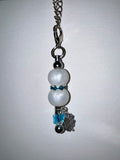 “Sigue Tus Sueños” Pearl and Teal Crystal Accent Silver-Tone Cup Charm
