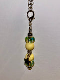 Cup Charm w/Yellow, Green & Blue Accents & Green Enamel Star Embellishment