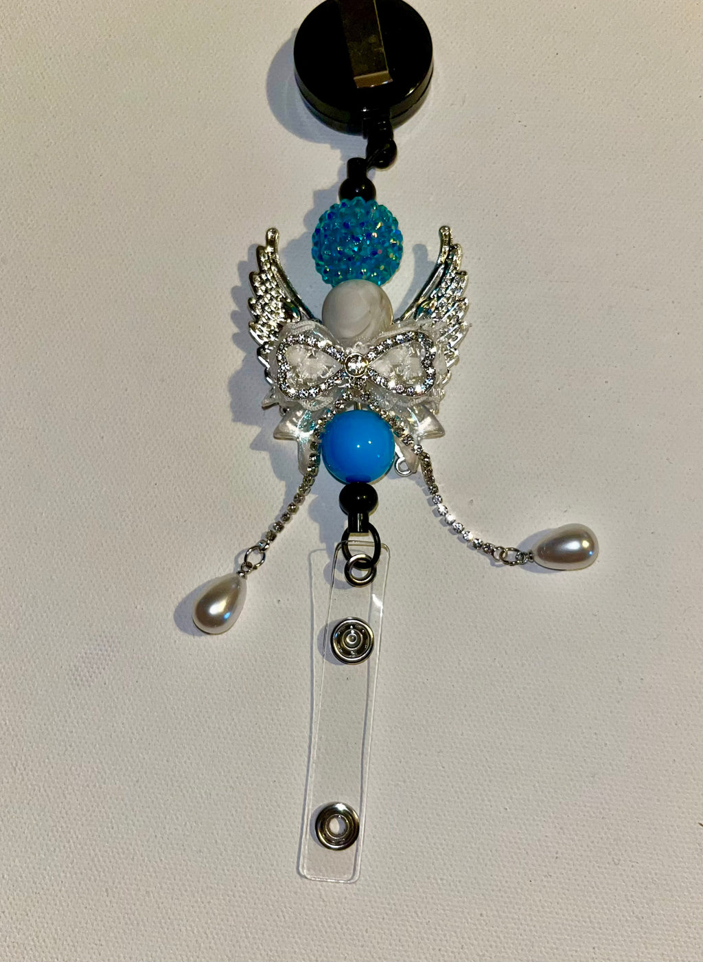 Turquoise & White Crystal Angel Wing Badge Reel w/Sky Blue Silicone & Pavé Bead