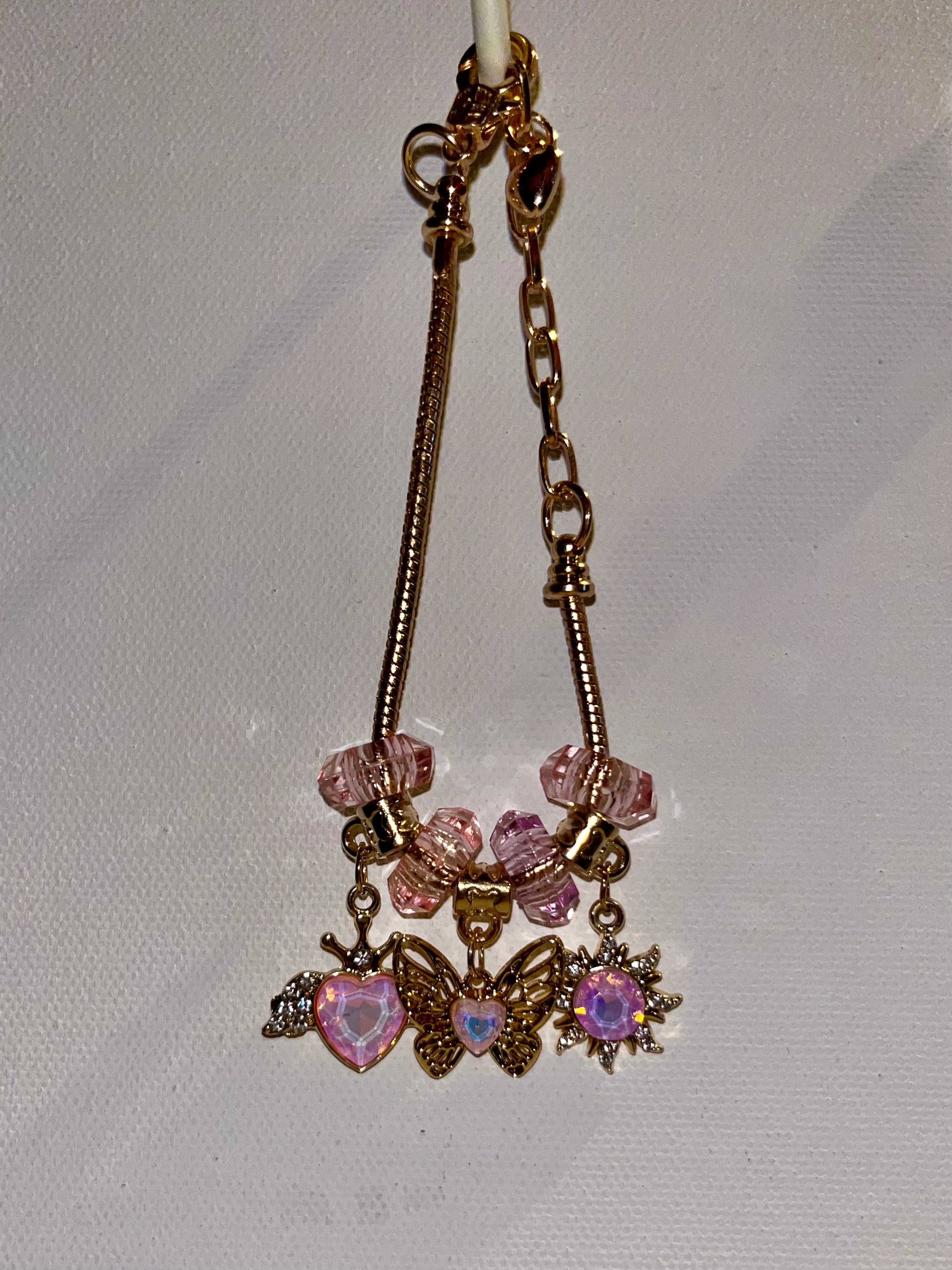 Gold-Tone Pink Crystal Charm Bracelet with Butterfly, Heart & Sun Charms
