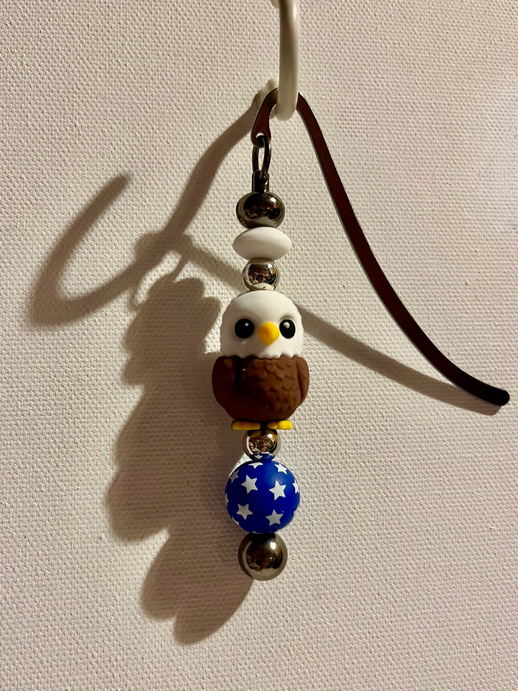 Cute Patriotic Brown & White Eagle Bookmark Featuring a Blue Bead w/White Stars