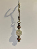 Cracked Iridescent Crystal Globe Keychain with Red Rhinestone Accent Detailing