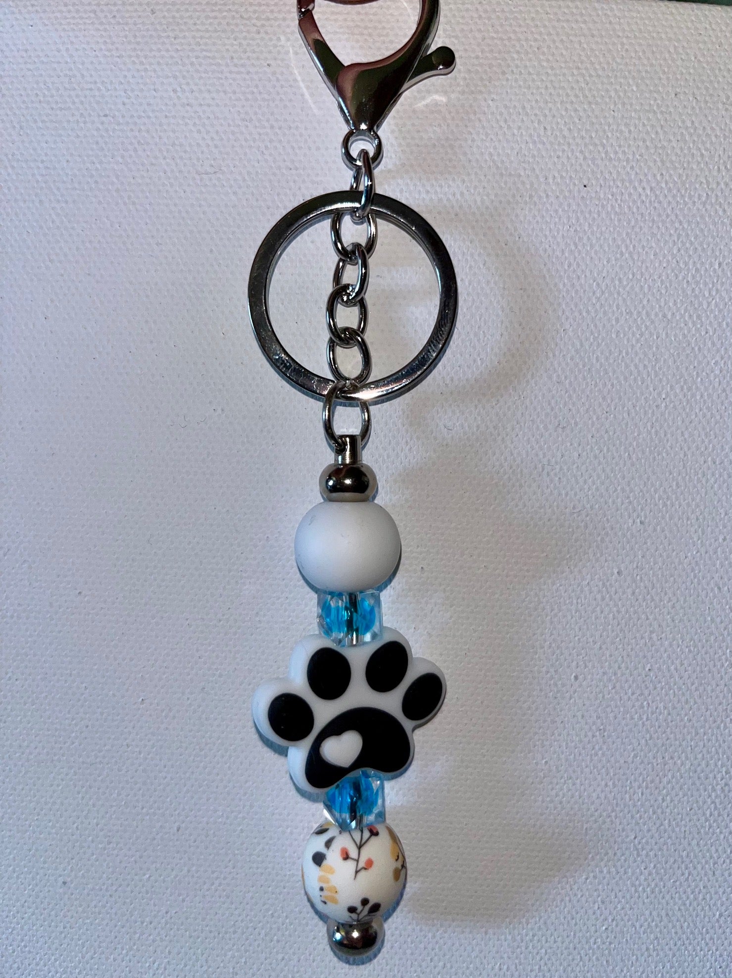 White & Black Pawprint Charm Keychain w/Blue Glass Beads & Flower Decor Accents
