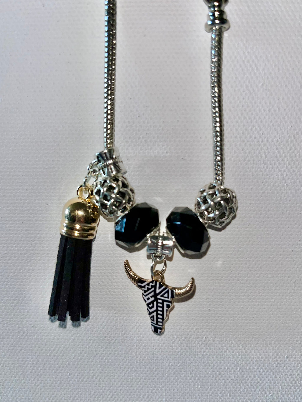 Silver Snake Charm Bracelet w/Black & Silver Beads, Gold Tassel & Bull Pendant