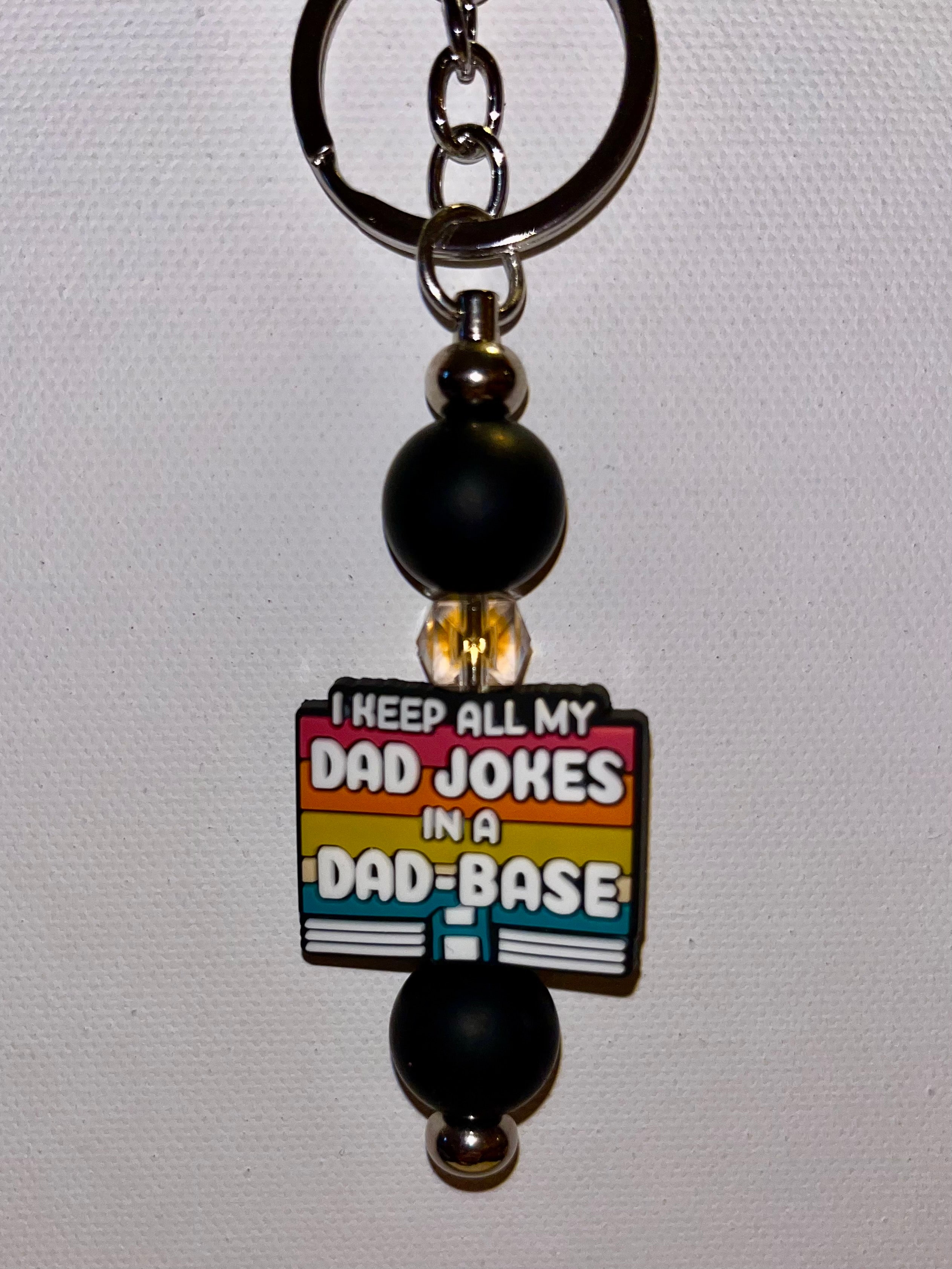 ‘I Keep All My Jokes in a Dad-Base’ Black with Retro Stripes Keychain