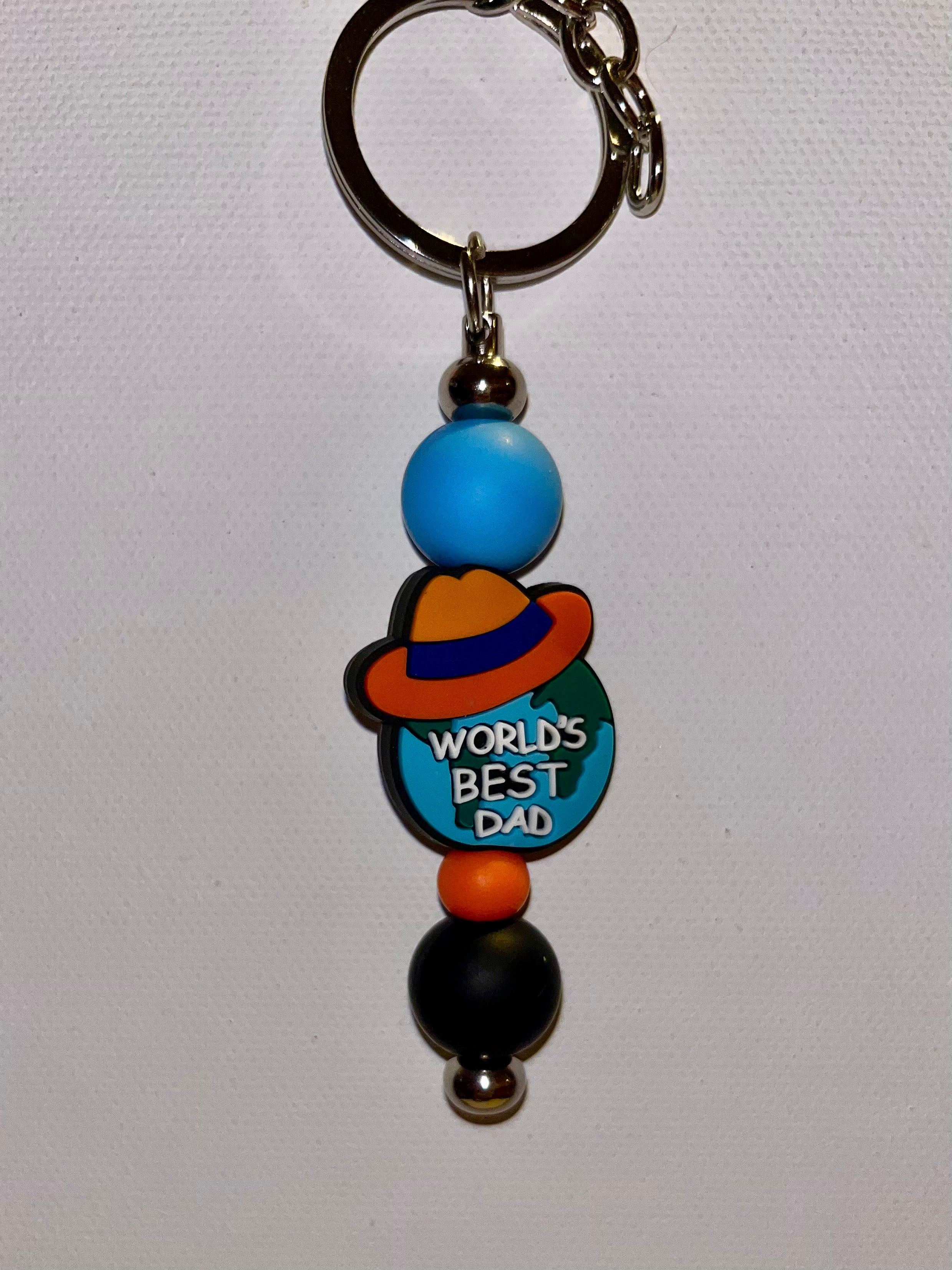 ‘World's Best Dad’ Globe w/Hat Charm Keychain in Blue, Orange & Black