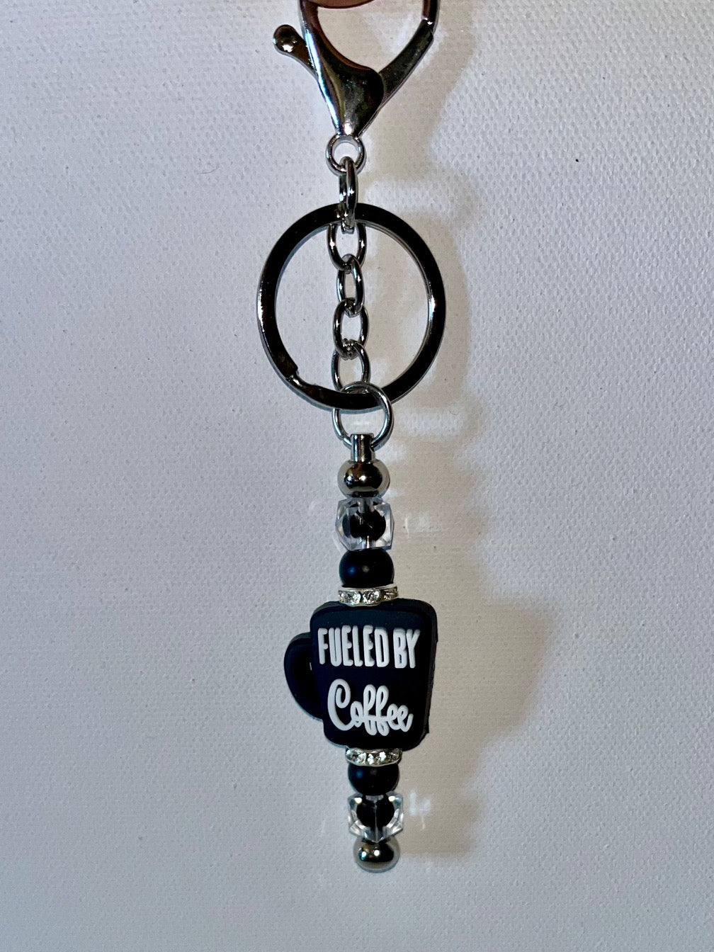 Black Beaded Keychain w/“Fueled by Coffee” Charm